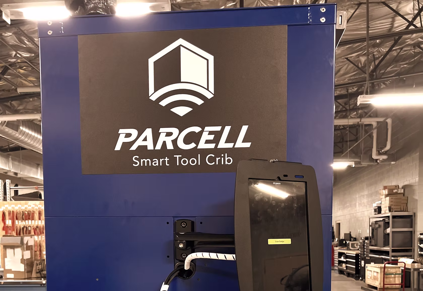 A Parcell Smart Tool Crib installed in an aviation maintenance bay, showing controlled-access drawers and a maintainer kiosk